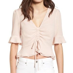 ‘Cinch Front Crop Top in Blush Polka Dot’ by ASTR. Purchased at Nordstrom.